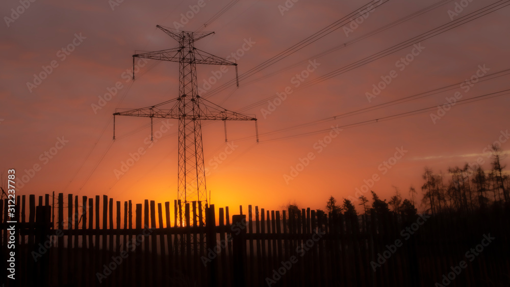 high voltage post,High voltage tower sky surise background