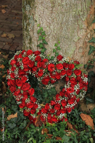 Red Heart shaped sympathy flowers