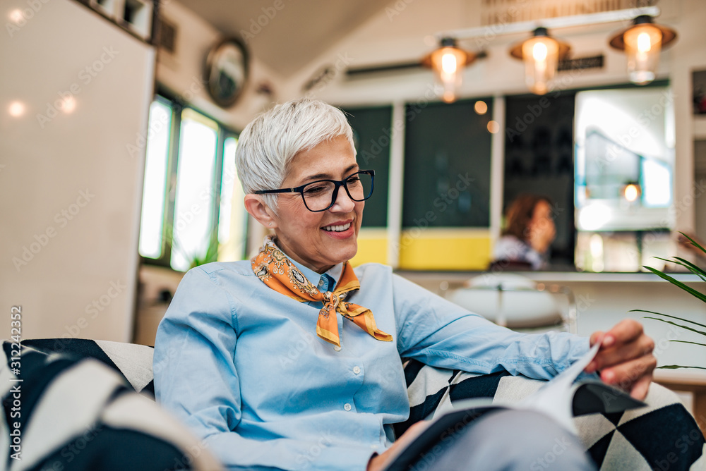 Close-up portrait of a happy senior woman relaxing at home. Close-up portrait of a happy senior woman relaxing at home.