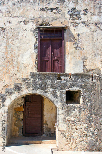 old door in wall © thanasis