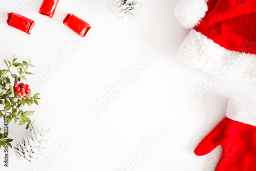 red christmas card with santa hat © izzetugutmen