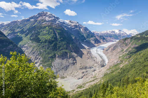 Alaskian mountain scene with salmon glacier and lagoon photo