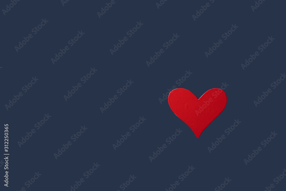 Neutral blue background with a red heart for your projects, a place for an inscription, Valentine's Day. Neutral blue background with a red heart for your projects, a place for an inscription, Valentine's Day.