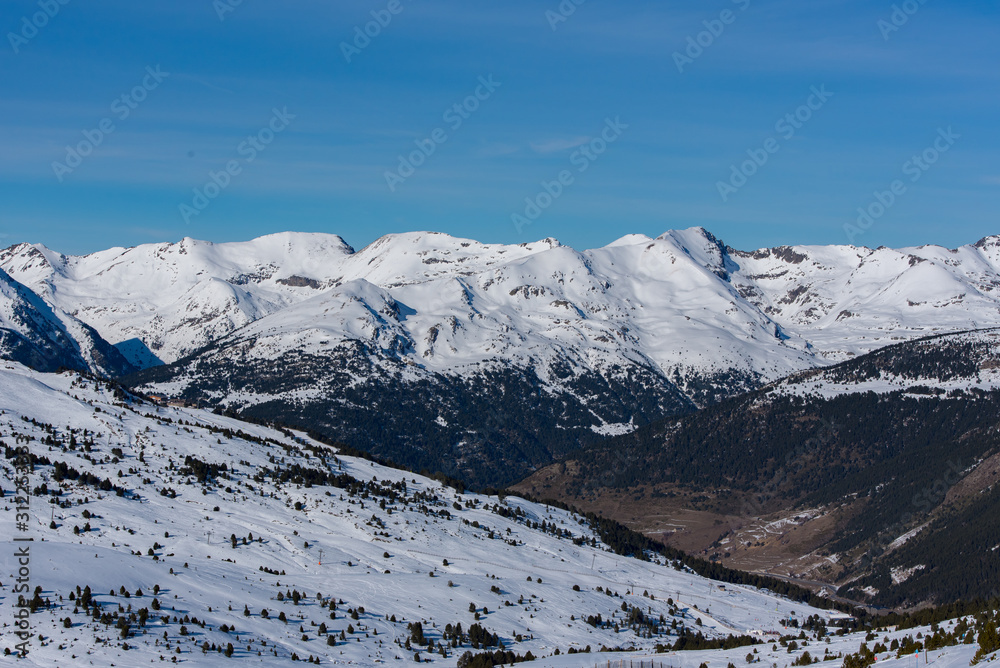 Grandvalira, Andorra : 2019 December 28 : People having fun in Sunny Day on Grandvalira Ski Station in Andorra.