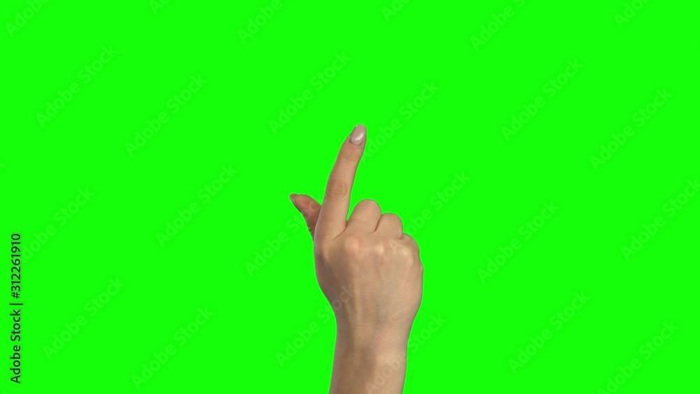 Arm of female scrolling a screen. Green screen. Close up Arm of female scrolling a screen. Green screen. Close up