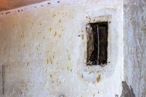 old ventilation shaft and grate ventilation system during repair work in the room