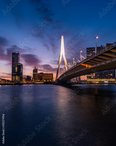 Sunrise at Rotterdam, the Netherlands, looking over the river that crosses the city.