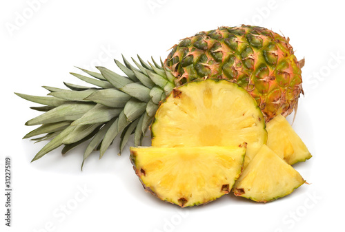 Pineapple fruit pieces, whole and rings isolated on white background. Perfectly retouched, full depth of field on the photo. Top view, flat lay