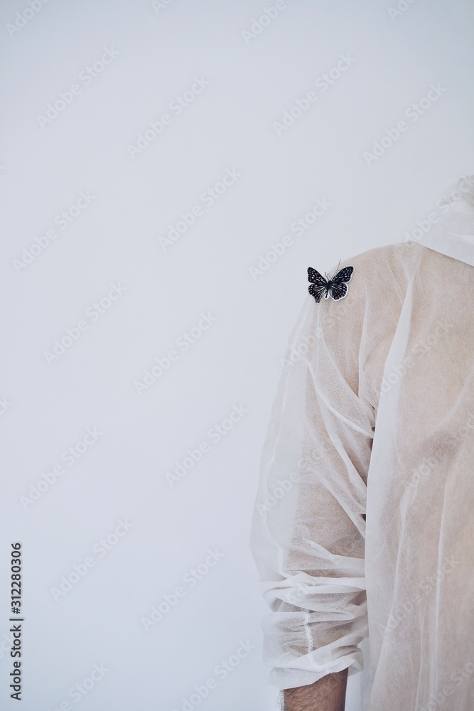 clothes and butterfly on white background clothes and butterfly on white background