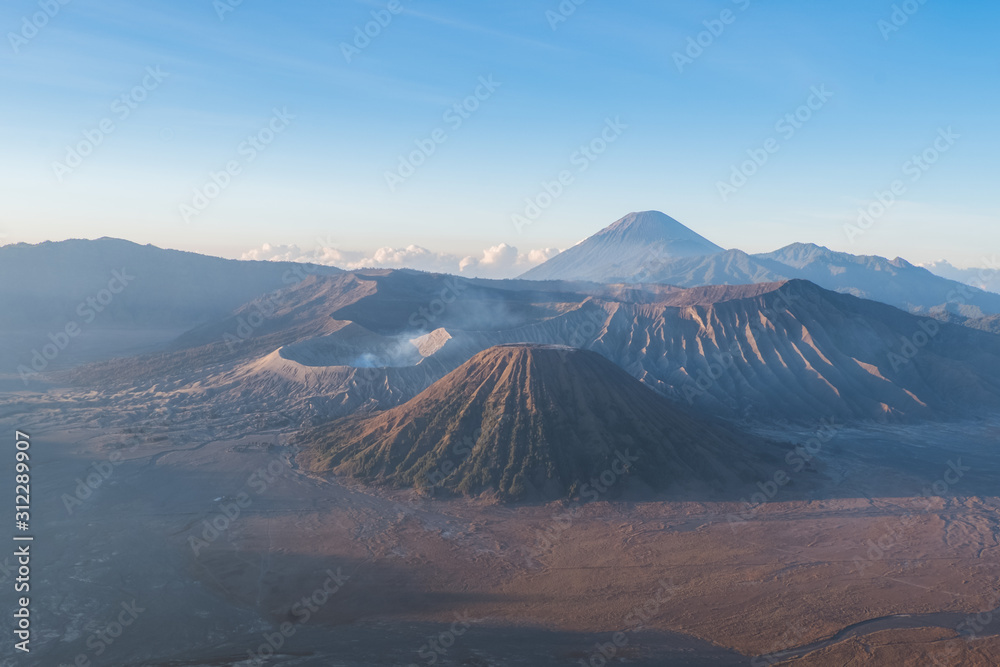 Mount Bromo volcano with the scene of the shadow of the tree. during sunrise from viewpoint on Mount Penanjakan, in East Java, Indonesia.the most popular destinations in Indonesia.