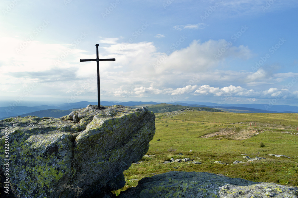 A magnificent viewpoint panoramic at the top of a mountain with a religious cross. Saint Jacques de Compostelle pilgrimage A magnificent viewpoint panoramic at the top of a mountain with a religious cross. Saint Jacques de Compostelle pilgrimage