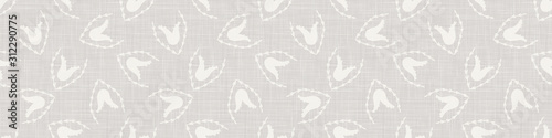 Gray french country style linen texture border background. Printed with white tulip flower. Natural ecru flax fibre bloom seamless border pattern. Classic yarn close up weave texture ribbon trim edge.