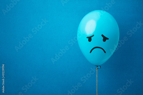 Obraz na plátně Stock photo of a blue monday balloon on a blue background