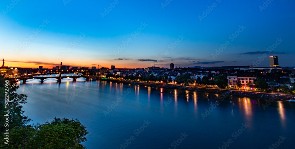 Panoramic view of Basel after sunset, Switzerland