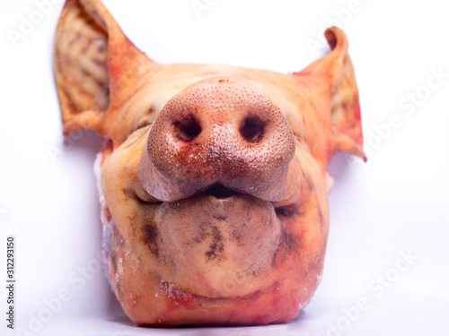 chopped pork head bottom view.. on white background. pork meat concept isolated close-up photo