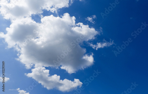 Blue sky clearly background with clouds