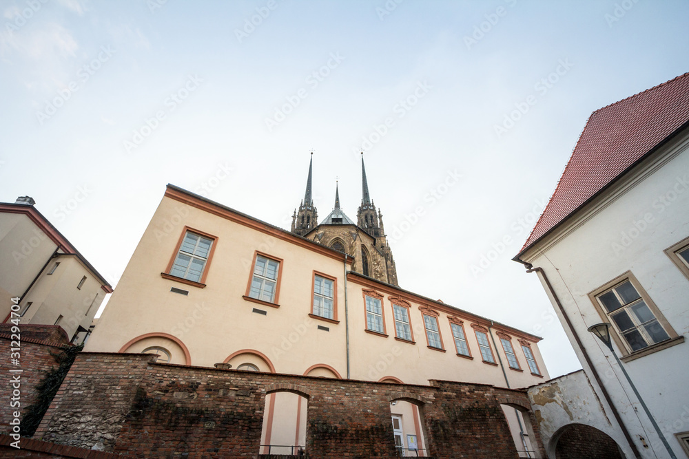 Obraz premium Brno Cathedral of saints peter and paul, seen from the bottow of Petro Hill, at dusk. Also called katedrala svateho petra a pavla, it is a major landmark of the city of Brno, Moravia, Czech Republic