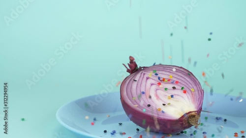  food design. half of the onion is sprinkled with confecti onery sugar sprinkles