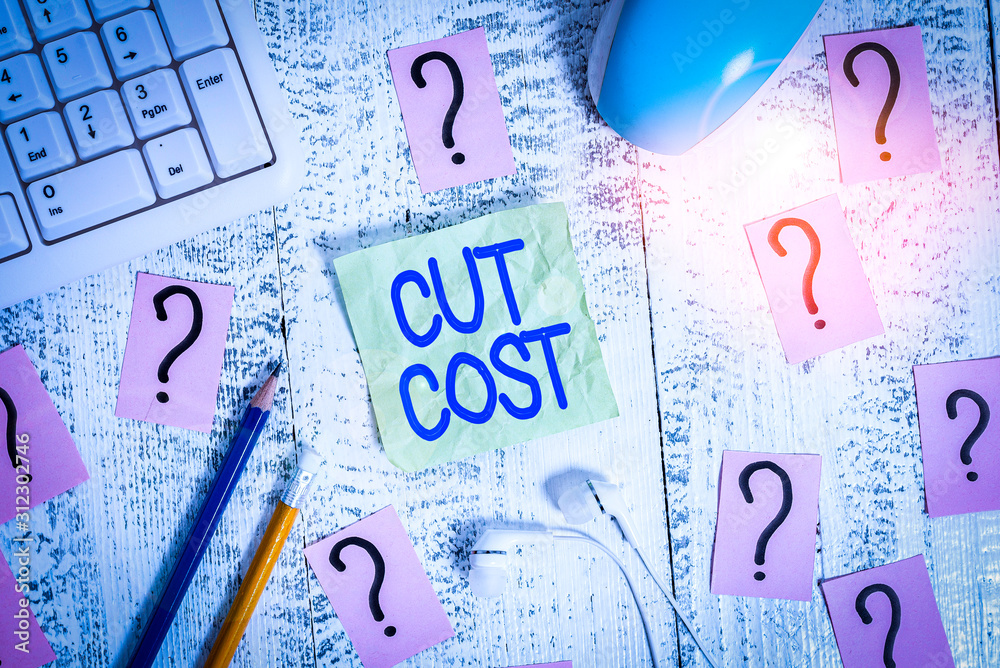 Word writing text Cut Cost. Business photo showcasing Measures implemented to reduced expenses and improved profit Writing tools, computer stuff and scribbled paper on top of wooden table Word writing text Cut Cost. Business photo showcasing Measures implemented to reduced expenses and improved profit Writing tools, computer stuff and scribbled paper on top of wooden table