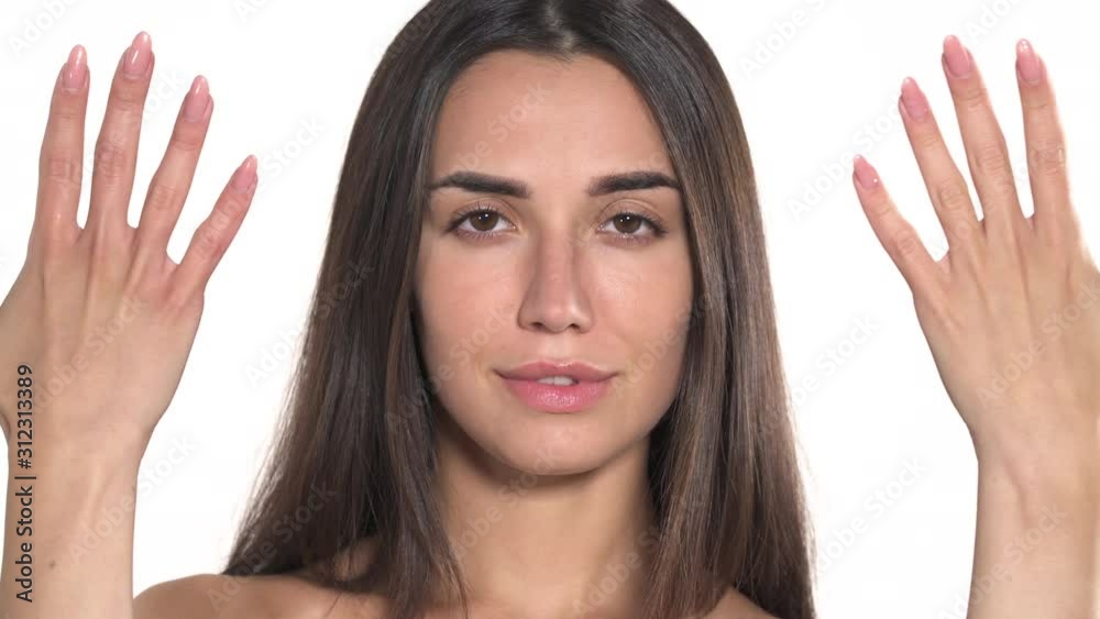 Portrait of beautiful young woman closing her face with palms and opening it. Body language concept. True emotions, gorgeous, charming, feminine Portrait of beautiful young woman closing her face with palms and opening it. Body language concept. True emotions, gorgeous, charming, feminine