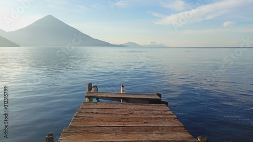  Wooden bridges and boards with a sea and island background