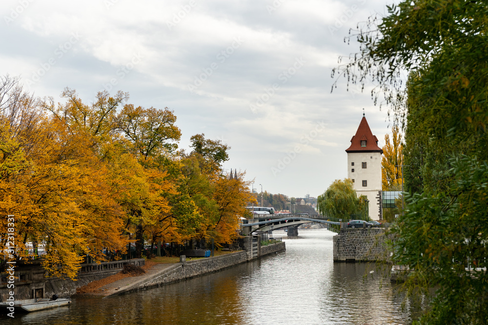 Water tower near river Vltava in Prague on a cloudy day in autumn