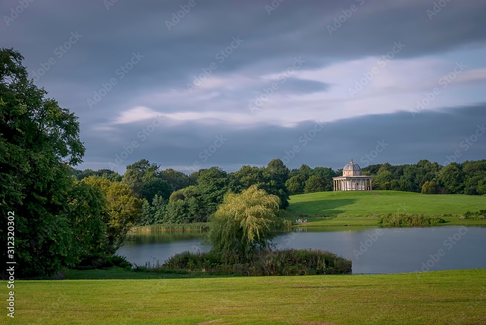 An calm autumn day overlooking the lake at Hardwick Park in Sedgefield, County Durham, UK - obrazy, fototapety, plakaty 