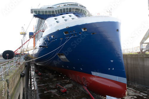 Ship in dry dock in a port for repairs