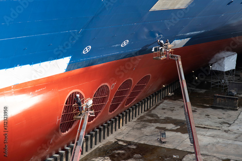 Ship in dry dock in a port for repairs