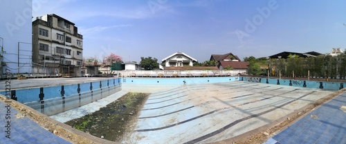 Fototapeta Naklejka Na Ścianę i Meble -  old dirty pool with no water