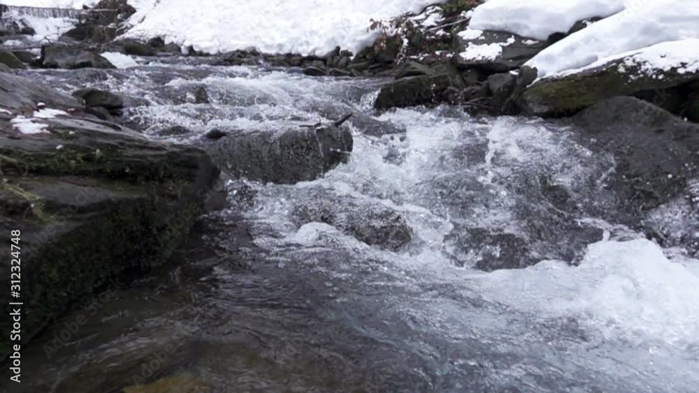 winter forest river. slow motion. winter forest river. slow motion.