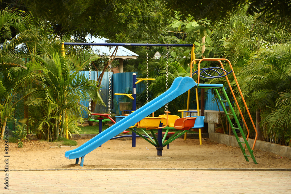 children's play park. A playground, playpark, or play area is a place specifically designed to enable children to play there. It is typically outdoors.