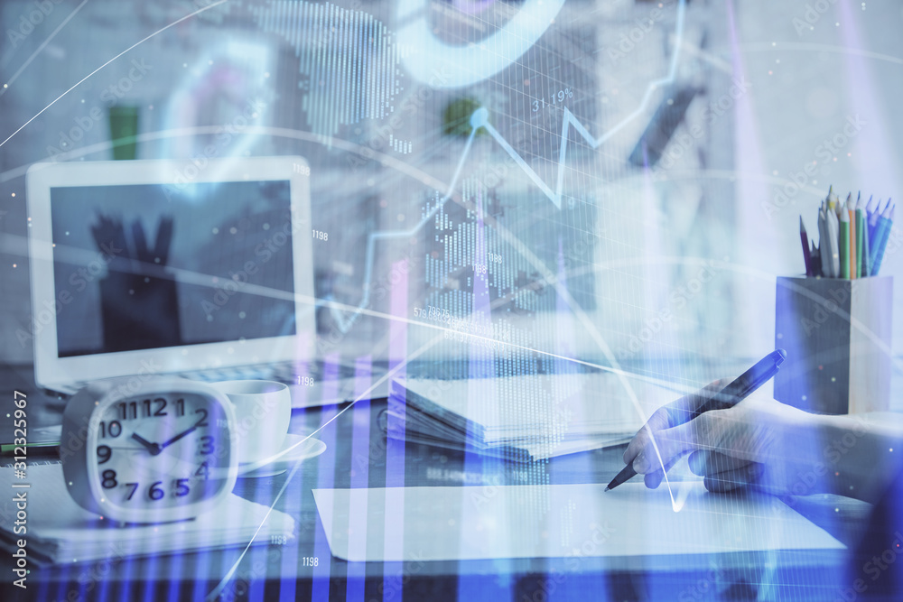Financial graph displayed on woman's hand taking notes background. Concept of research. Multi exposure Financial graph displayed on woman's hand taking notes background. Concept of research. Multi exposure
