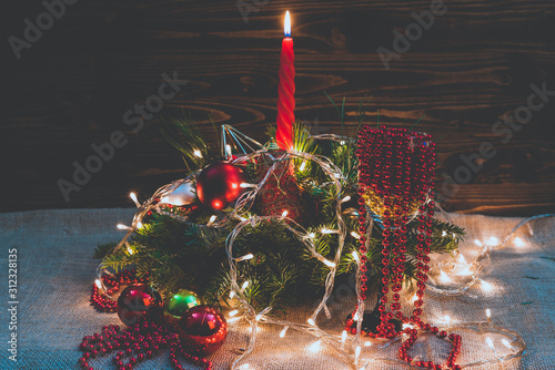 natural Stona Christmas decoration with candle and light bulbs photo