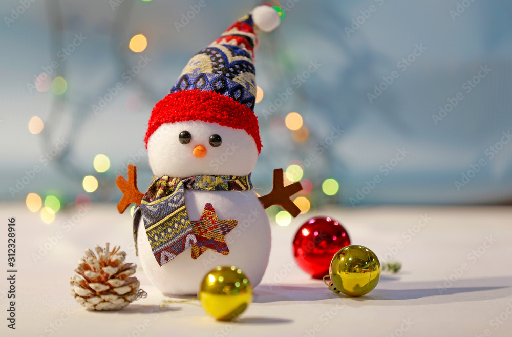 Christmas snowman and light background