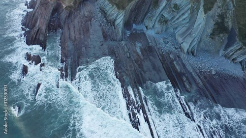 Zumaia and Deba flysch geological strata layers drone aerial view, Basque Country photo