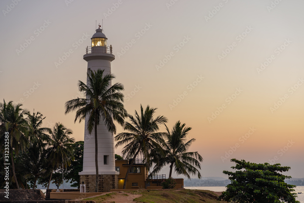 Lighthouse during sunset in Galle, Sri Lanka