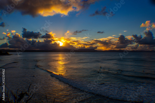 Wallpaper Mural Sunset Surfers Surfing Scenic Byron Bay in Australia Torontodigital.ca
