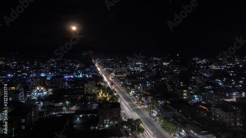 Cityscape of downtown in Myanmar at night with traffic light 