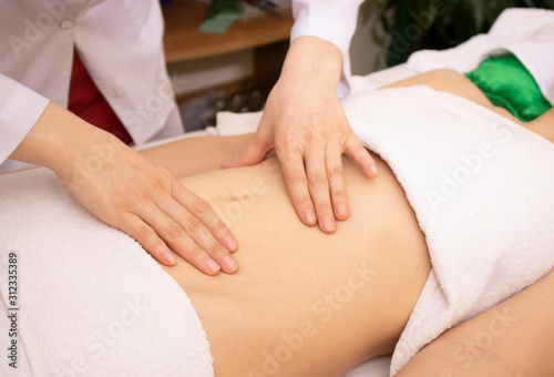 Belly massage in spa salon  thai therapy