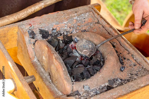 clay horn burning coals making weapons bullets musket casting traditional production
