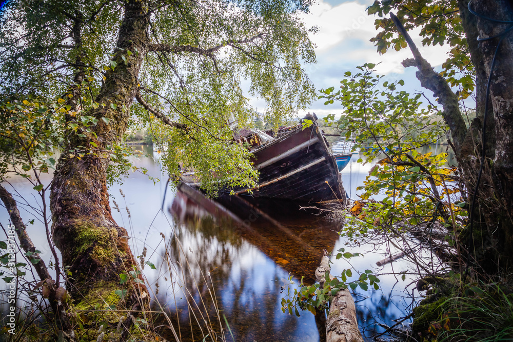 Old shipwreck at Loch Ness near Fort Augustus Old shipwreck at Loch Ness near Fort Augustus
