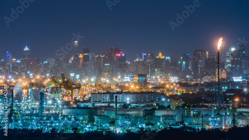 Chemical industry plant of oil refinery plant at night. © May_Chanikran