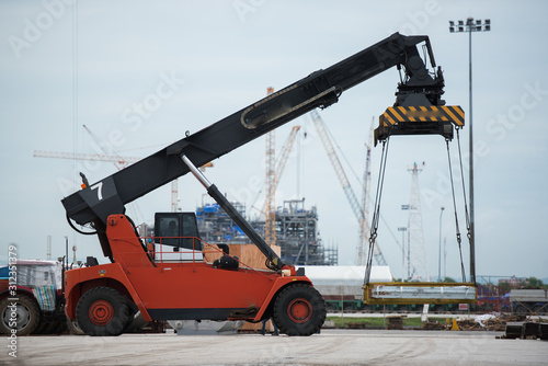 Forklift loading the on construction site.