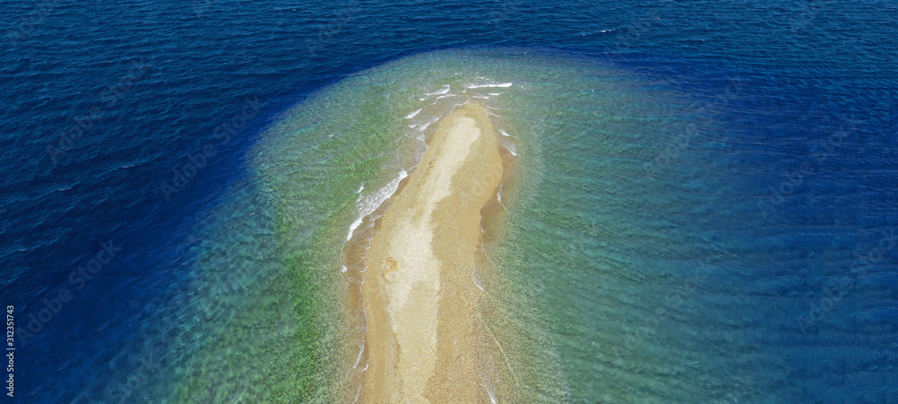 Aerial drone ultra wide photo of tropical exotic turquoise sand bar in exotic bay