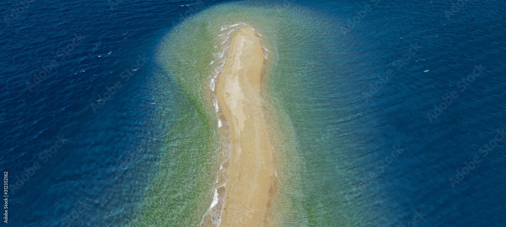 Aerial drone ultra wide photo of tropical exotic turquoise sand bar in exotic bay