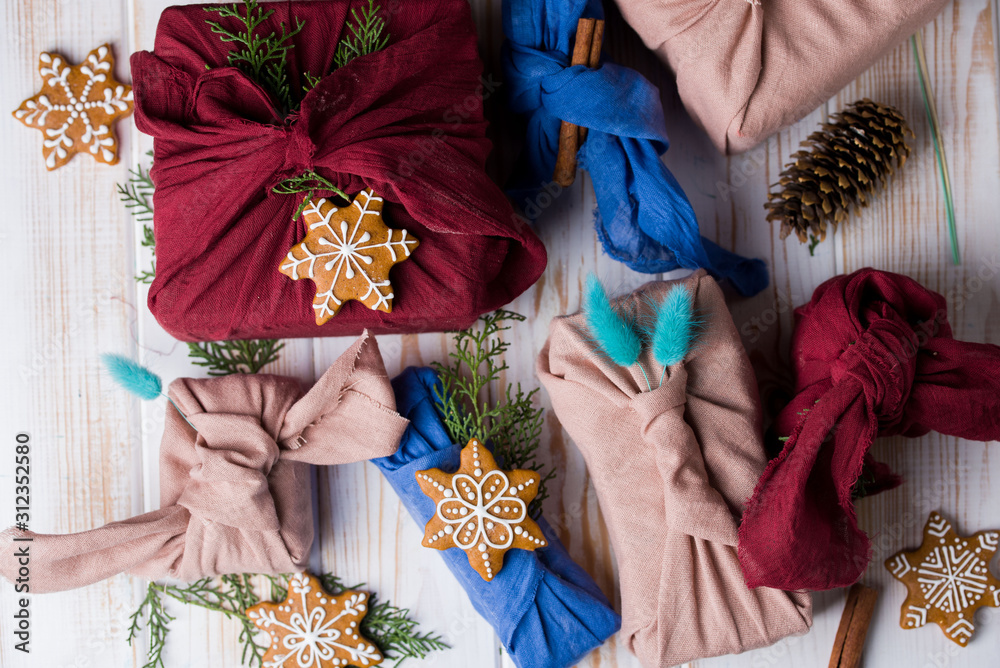 Christmas furoshiki wrapping. Etnical hristmas gift. Zero waste concept