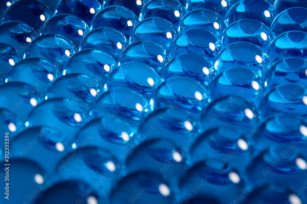 Texture of blue gel balls with blur Texture of blue gel balls with blur