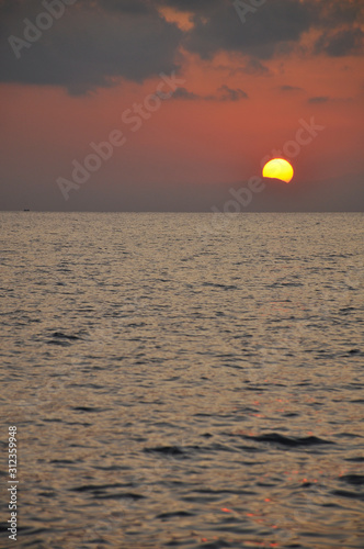 Fototapeta Naklejka Na Ścianę i Meble -  Beautiful sunset on the sea. Travel, vacation, evening
