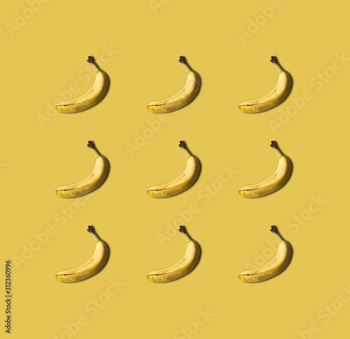 Bananas pattern isolated on background. Summer fruit.